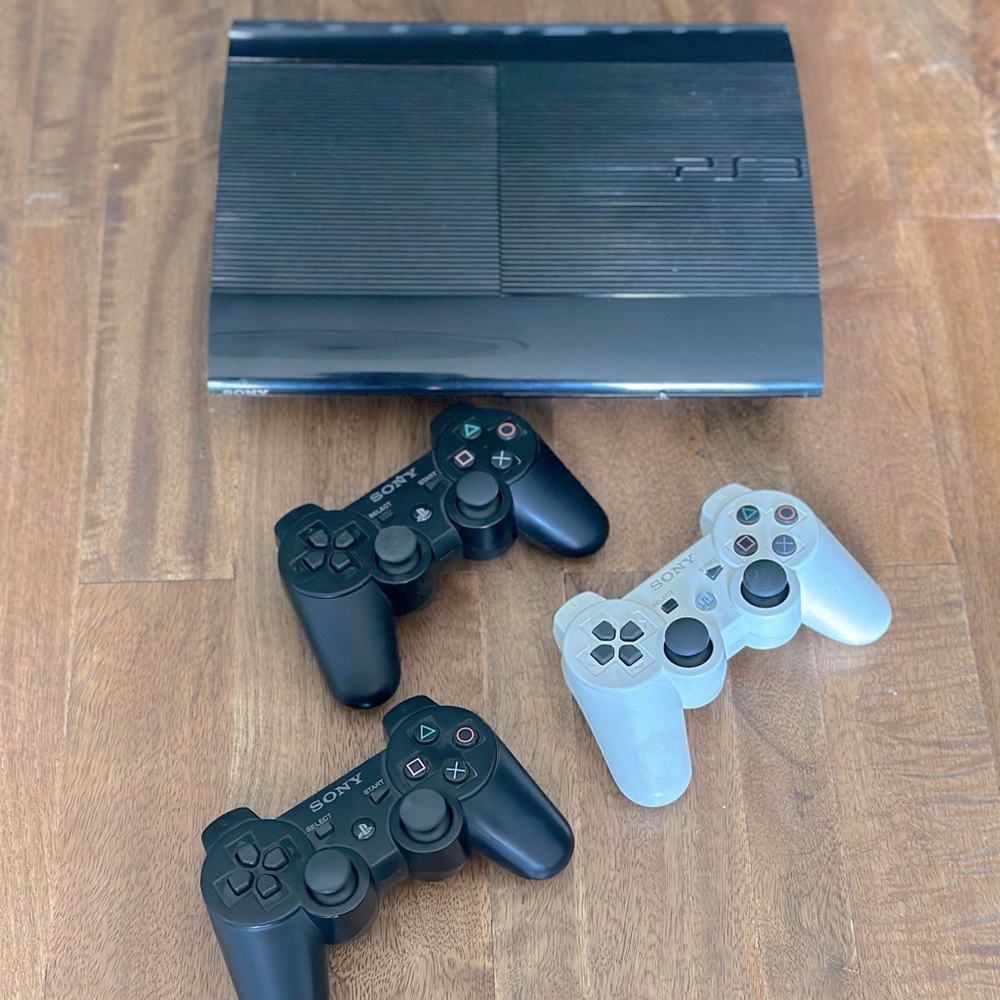 PlayStation 3 - 250GB Super Slim Console w/19 games and 3 controllers